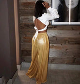 Pantalones anchos con cintura alta y purpurina
